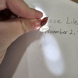 Sarah Briggs 14k gold Claude set two stone petals ring with garnet & white topaz